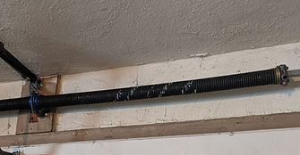 Broken Garage Door Spring Replacement