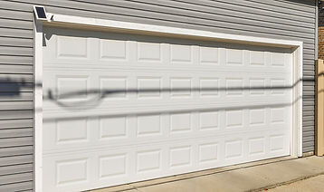 New residential garage door and LiftMaster opener installed in Chicago, Illinois by Trusted Garage Door
